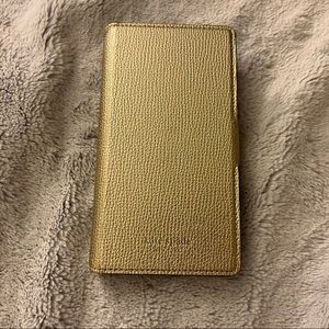 Kate Spade used IPhone XS case. 2 card spaces inside. Added cat kick stand
